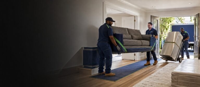 Crew removing furniture and appliances from a New York apartment